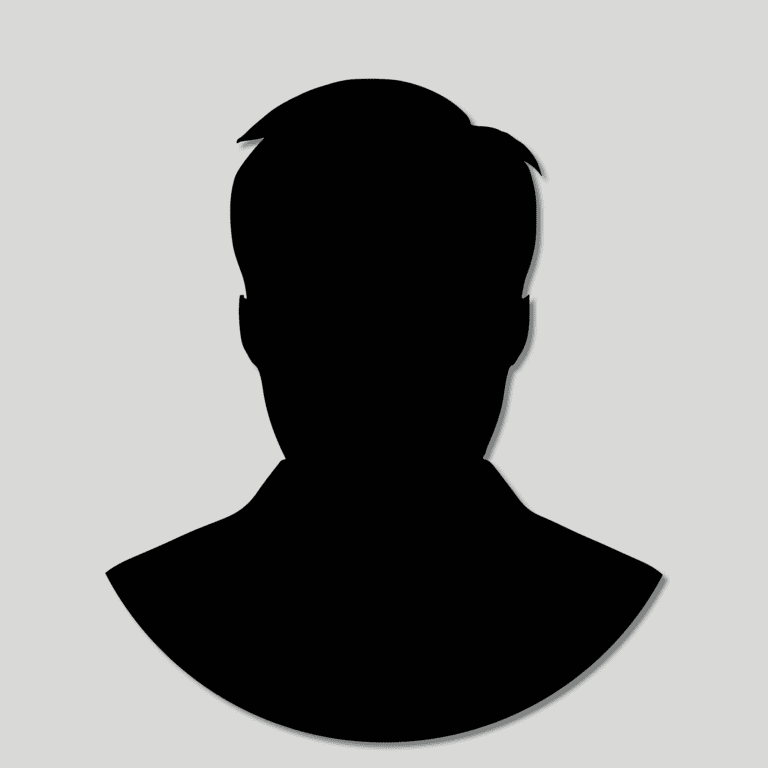 Silhouette of a person’s head and shoulders against a light gray background.