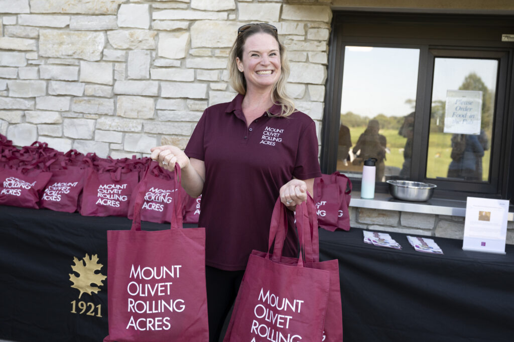 Danielle holding gift bags